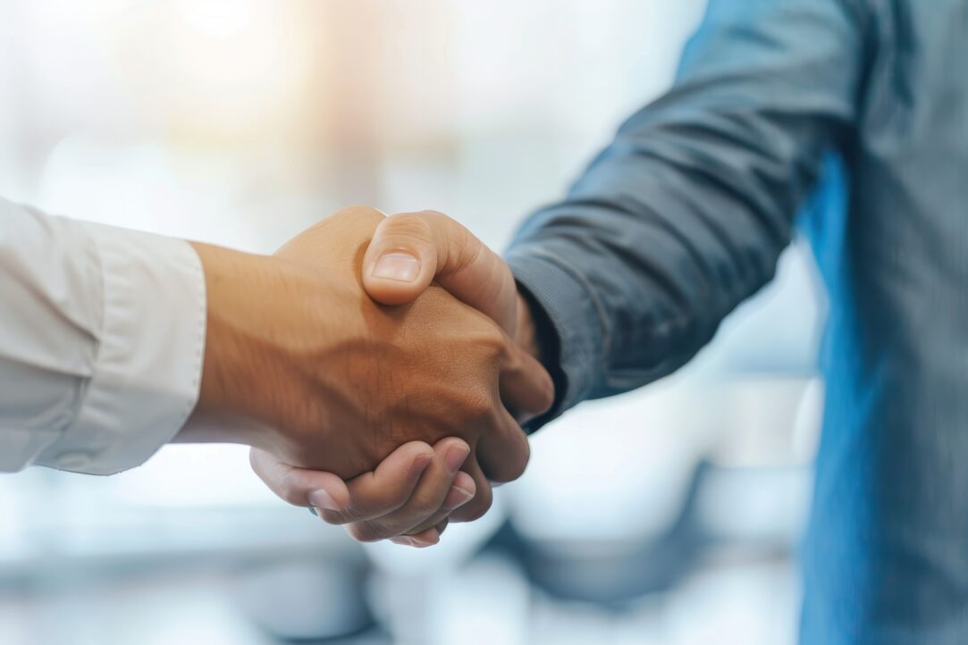 Businessmen handshake in photography shot   business meeting and partnership concept with copy space